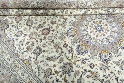 Close-up detail of 2000s Kashan rug from Iran / Persia showing Wool weave