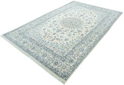 Corner detail of New Nain rug showing border pattern and Wool pile