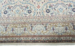 Close-up detail of 1950s Kashan rug from Iran / Persia showing Wool weave