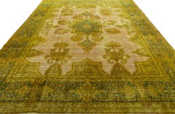 Surface texture of 1950s Vintage rug with natural Wool and intricate pattern