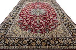 Surface texture of 2000s Najafabad rug with natural Wool and intricate pattern