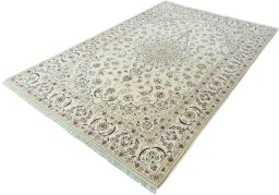 Corner detail of 2000s Nain rug showing border pattern and Wool pile
