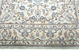 Full view of 2000s Kashan rug from Iran / Persia, 299 × 200 cm in Beige tones