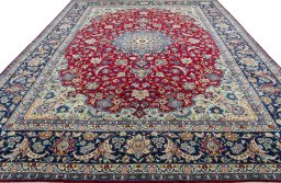 Surface texture of 2000s Najafabad rug with natural Wool and intricate pattern
