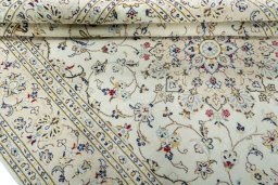 Close-up detail of 2000s Kashan rug from Iran / Persia showing Wool weave