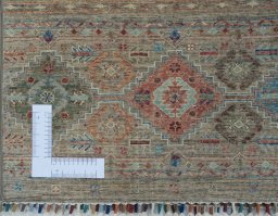 Corner detail of New Samarkand rug showing border pattern and Wool pile