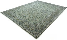 Corner detail of 2000s Kashan rug showing border pattern and Wool pile