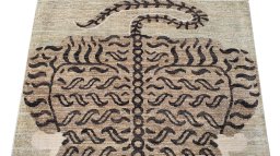 Backside of handmade New Farahan rug showing knot structure and weave density