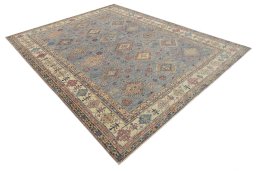 Corner detail of New Kazak rug showing border pattern and Wool pile