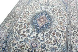 Backside of handmade 2000s Nain rug showing knot structure and weave density