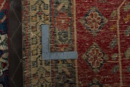 Surface texture of 2000s Sirjan rug with natural Wool and intricate pattern