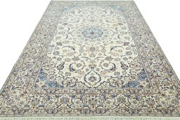 Surface texture of New Nain rug with natural Wool and intricate pattern