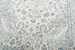 Close-up detail of 2000s Nain rug from Iran / Persia showing Wool weave