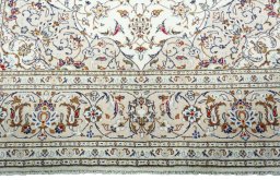 Full view of 2000s Kashan rug from Iran / Persia, 302 × 200 cm in Beige tones