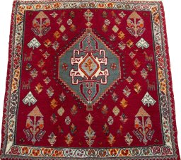 Surface texture of 2000s Shiraz rug with natural Wool and intricate pattern
