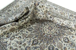 Surface texture of 2000s Kashan rug with natural Wool and intricate pattern