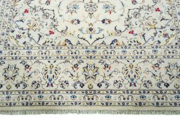 Full view of 2000s Kashan rug from Iran / Persia, 296 × 196 cm in Beige tones