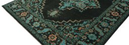Backside of handmade New Farahan rug showing knot structure and weave density