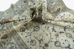 Surface texture of 2000s Kashan rug with natural Wool and intricate pattern