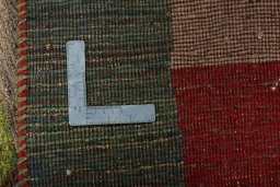 Close-up detail of 2000s Persian Gabbeh rug from Pakistan showing Wool weave