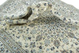 Surface texture of New Kashan rug with natural Wool and intricate pattern