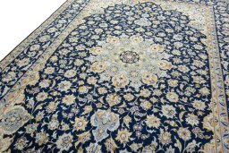 Backside of handmade 2000s Najafabad rug showing knot structure and weave density