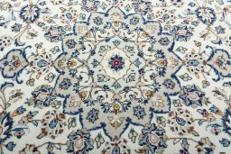 Central medallion detail of 2000s Kashan rug from Iran / Persia