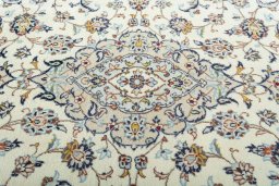 Central medallion detail of 2000s Kashan rug from Iran / Persia