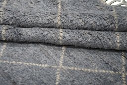 Corner detail of New Morocco rug showing border pattern and Wool pile