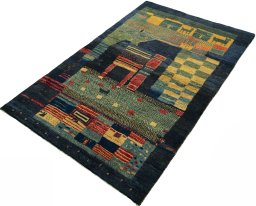 Corner detail of 2000s Persian Gabbeh rug showing border pattern and Wool pile