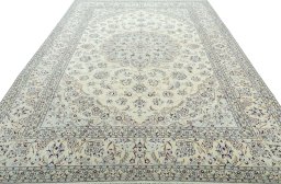Surface texture of 2000s Nain rug with natural Wool and intricate pattern