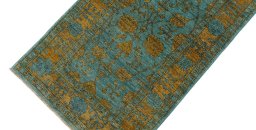 Backside of handmade New Farahan rug showing knot structure and weave density