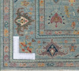 Corner detail of New Farahan rug showing border pattern and Wool pile