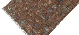 Backside of handmade New Samarkand rug showing knot structure and weave density
