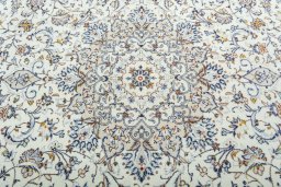 Central medallion detail of 2000s Kashan rug from Iran / Persia