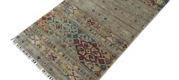 Backside of handmade New Samarkand rug showing knot structure and weave density