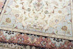 Close-up detail of New Tabriz 50/60/70 Raj rug from Iran / Persia showing Cork weave