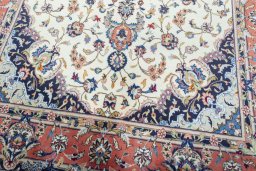 Close-up detail of 2000s Kashan rug from Iran / Persia showing Wool weave