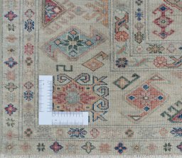 Corner detail of New Kazak rug showing border pattern and Wool pile