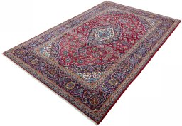 Corner detail of New Kashan rug showing border pattern and Wool pile