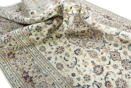 Surface texture of New Kashan rug with natural Wool and intricate pattern