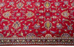 Full view of 2000s Kashan rug from Iran / Persia, 385 × 101 cm in Red tones