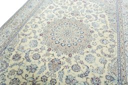Backside of handmade 2000s Nain rug showing knot structure and weave density