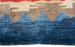 Central medallion detail of 2000s Persian Gabbeh rug from Pakistan
