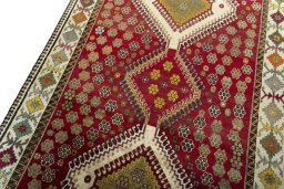 Backside of handmade 1970s Persian Gabbeh rug showing knot structure and weave density