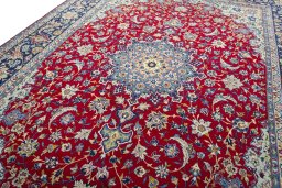 Backside of handmade 2000s Najafabad rug showing knot structure and weave density