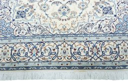 Full view of New Nain rug from Iran / Persia, 307 × 208 cm in Beige tones