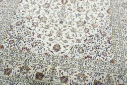 Close-up detail of 2000s Kashan rug from Iran / Persia showing Wool weave