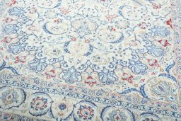 Close-up detail of 2000s Nain rug from Iran / Persia showing Wool weave