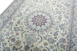 Backside of handmade 2000s Nain rug showing knot structure and weave density